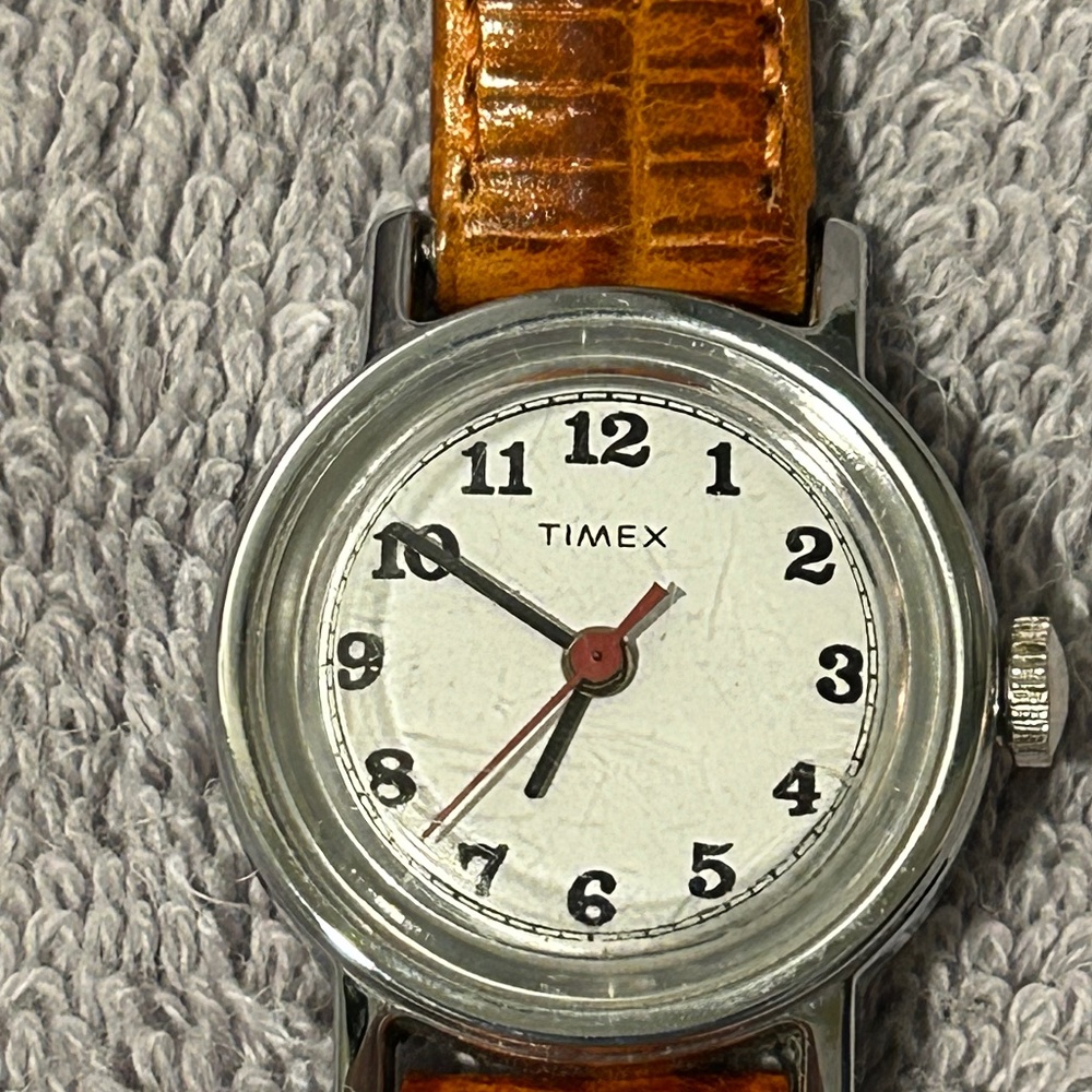 The Vintage Timex Wind Mechanical Silver Tone Round Case